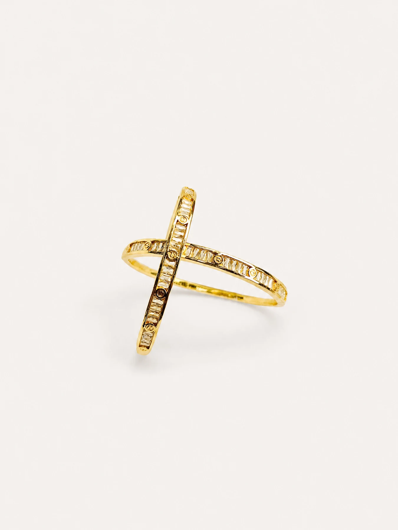 Gold-tone crossed band ring from the eMarket247 rings category